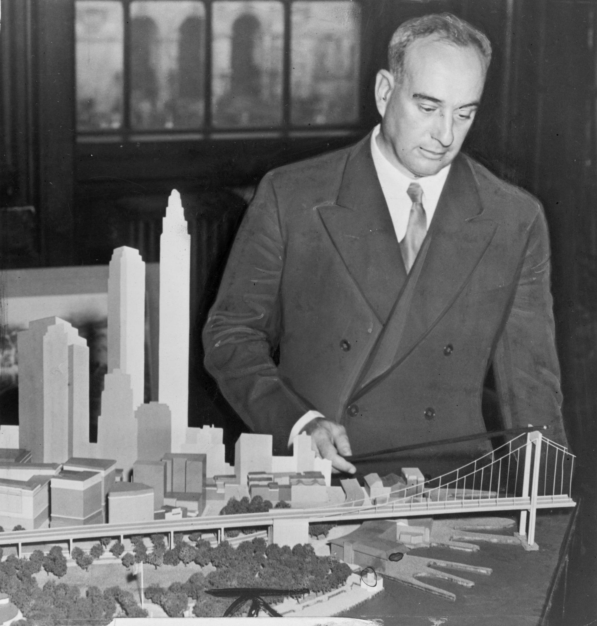 http://upload.wikimedia.org/wikipedia/commons/a/ab/Robert_Moses_with_Battery_Bridge_model.jpg